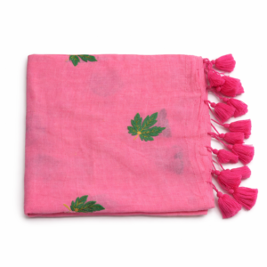 Candy pink Mul cotton saree featuring green leaf embroidery and pink tassels.